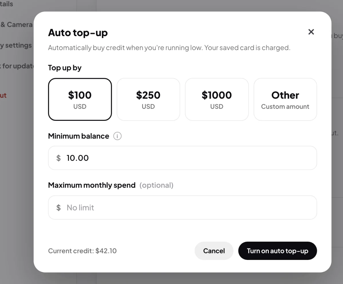 The Auto top-up window: Top up by with $100 chosen, Minimum balance filled in as 10.00, Maximum monthly spend empty showing No limit, and the Turn on auto top-up button; the two fields are outlined.